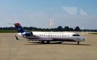 N223JS @ KLEX - Pushback for taxi Lexington - by Ronald Barker