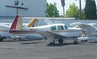 N6416U @ KRHV - A local 1962 Mooney M20C parked beside the Victory Aero hangar at Reid Hillview Airport, CA. - by Chris Leipelt