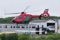 G-WASN @ EGFH - Wales Air Ambulance helicopter (Helimed 57) departing base. - by Roger Winser