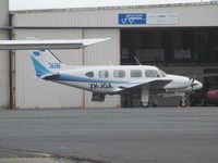 ZK-JGA @ NZAR - New airline - North Shore Air!! - by magnaman