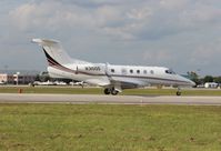 N310QS @ ORL - Net Jets Phenom 300 - by Florida Metal