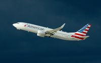 N939NN @ KLAX - American Airlines, departs here in front of a heavy thunderstorm at Los Angeles Int'l(KLAX) - by A. Gendorf