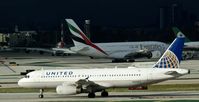 N406UA @ KLAX - United, is here on its way to the gate at Los Angeles Int'l(KLAX) - by A. Gendorf