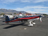N410WB @ SZP - 1991 Extra Fleugzeugbau Gmbh EXTRA EA-300, Lycoming AEIO-540-L1B5 300 Hp, note: easier, less disorienting view of aileron spade. Extra fenestration aids inverted flight. - by Doug Robertson
