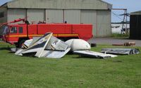XL472 @ EGFH - Tailplane, fin, inner and outer folding wing sections and radome of the ex-Royal Navy aircraft recently delivered to Swansea Airport. - by Roger Winser