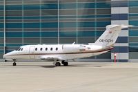 OE-GCH @ LOWW - Cessna Citation VII [650-7006] Vienna-Schwechat~OE 13/07/2009. Slight flare as taken through coach window. - by Ray Barber