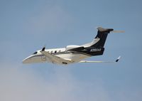 N392AS @ MIA - Phenom 300 - by Florida Metal