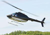 G-PRFI @ EGFH - Jet Ranger II. - by Roger Winser