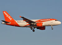 G-EZDL @ LEBL - Landing rwy 25R in new c/s - by Shunn311