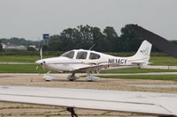 N614CY @ KAMW - Photographed by hanging over a fence and shooting over the wing of a twin Cessna.