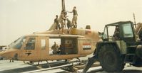 5722 @ QJB - HMLA 369 Flight Line Crew dismantling 214ST for transport during desert storm.. (Me) CpL Sal Briones wearing sun glasses.. Had Sgt  Joe Unwin take photo using my disposable camera - by HMLA 369 Mechanic-Possibly Sgt  Joe Unwin