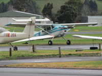 ZK-DWE @ NZAR - on crowded ramp - awaiting work - by magnaman