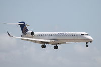 N162GJ @ KSRQ - United Flight 3641 operated by GoJet (N162GJ) arrives at Sarasota-Bradenton International Airport following flight from Chicago-O'Hare International Airport - by Donten Photography