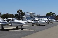 N79JT @ KRHV - A locally based 1979 Piper Seminole next to a huge local Piper Cheyenne IIII. I always thought these Seminoles were pretty big, but I guess not. Taken at Reid Hillview Airport, CA. - by Chris Leipelt
