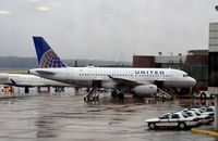 N812UA @ KRIC - At the gate RIC - by Ronald Barker