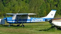 C-GHPK @ CYCD - Parked in the grass field at Nanaimo airport. - by M.L. Jacobs
