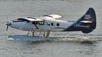 C-GVNL @ CYHC - Harbour Air #304 early morning arrival in Coal Harbour. - by M.L. Jacobs