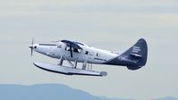 C-GVNL @ CYHC - Harbour Air #304 just departed Coal Harbour. - by M.L. Jacobs