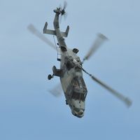 ZZ380 - Off airport. A Wildcat of the Royal Navy Helicopter Display Team Black Cats during a solo display on the first day of the Wales National Airshow held over Swansea Bay. Operated by 825 NAS. - by Roger Winser