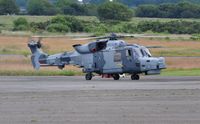 ZZ515 @ EGFH - Wildcat of the Royal Navy Helicopter Display Team Black Cats operated by 825 NAS. - by Roger Winser