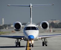 N286SJ @ KSJC - A transient 2012 Embraer ERJ-145XR taxing out for departure at San Jose International Airport, CA. - by Chris Leipelt