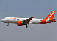 G-EZUA @ LEBL - Landing rwy 25R in interim c/s - by Shunn311