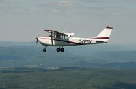 C-FPTN - Air to air of PTN over QC - by Chuck Clark