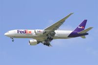 N853FD @ LFPG - Boeing 777-FS2, Short approach rwy 27R, Roissy Charles De Gaulle Airport (LFPG-CDG) - by Yves-Q