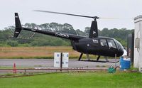 G-ROKS @ EGFH - Visiting Robinson Raven II/ - by Roger Winser