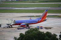 N297WN @ KTPA - Southwest Flight 3220 (N297WN) sits at the gate at Tampa International Airport following a flight from Indianaplis International Airport - by Donten Photography