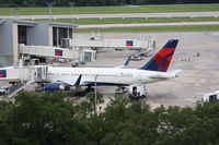 N662DN @ KTPA - Delta Flight 2230 (N662DN) sits at the gate at Tampa International Airport prior to a flight to Hartsfield Jackson Atlanta International Airport - by Donten Photography