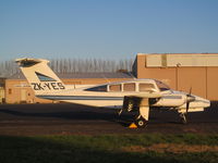 ZK-YES @ NZAR - in setting sun at AMZ - by magnaman