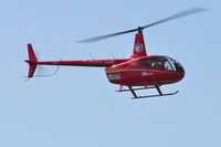 G-DIGA @ EGFH - Visiting Robinson R-66 helicopter operated by Helicopter Services. - by Roger Winser