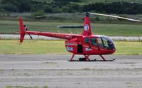G-DIGA @ EGFH - Visiting Robinson R-66 helicopter operated by Helicopter Services. - by Roger Winser