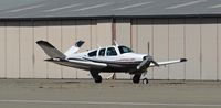 N950CA @ KRHV - A locally based 1974 Beechcraft V35B Bonanza with a new paint taxing to its tie down at Reid Hillview Airport, CA. - by Chris Leipelt