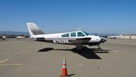 N7928R @ KRHV - A locally based 1969 Beechcraft Baron 55 cooking in the hot sunshine at Reid Hillview Airport, CA. - by Chris Leipelt