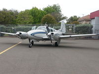 N2TL @ KHWD - Showcasing Beech Travel Air outside hangar. - by Terry Alexander