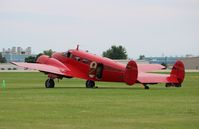 N868L @ KOSH - Beech D18S - by Mark Pasqualino