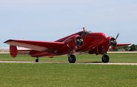 N868L @ KOSH - Beech D18S