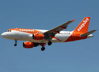 G-EZEV @ LEBL - Landing rwy 25R in new c/s - by Shunn311