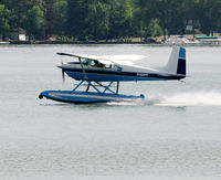N392PT - Taking off from Lac La Belle in southeast Wisconsin, August 6, 2015. - by Jim Wangard