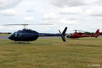 G-OCFD @ EGBT - Parked in the designated heli spots at Turweston Aerodrome EGBT - by Clive Pattle
