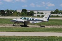 N2VV @ KOSH - Beech 58TC - by Mark Pasqualino