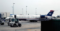 N247JS @ KCLT - At the gate CLT - by Ronald Barker
