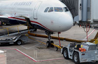 N565UW @ KCLT - Aircraft nose and tow bar CLT - by Ronald Barker
