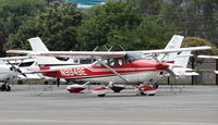 N9949E @ KRHV - Keyt LLC (Missoula, MT) transient 1975 Cessna 182P parked at the Trade Winds ramp on an overcast morning at Reid Hillview Airport, CA. - by Chris Leipelt