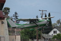 N8375Z @ KRHV - A locally based 1963 Cessna 210 departing on runway 31R at Reid Hillview Airport, CA. - by Chris Leipelt