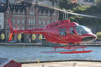 SE-HKP - Departing helipad near Old Town in Stockholm, Sweden. - by Anders Nilsson