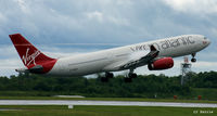 G-VSXY @ EGCC - Wing tip vortices and condensation on take-off at Manchester EGCC - by Clive Pattle