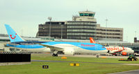 G-TUII @ EGCC - Taxy for departure Manchester Airport EGCC - by Clive Pattle